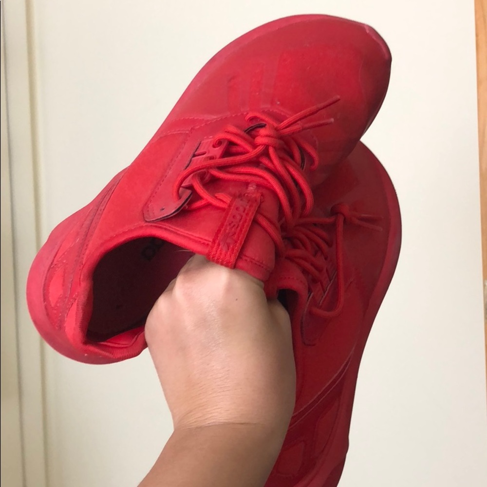 all red adidas tubular worn twice